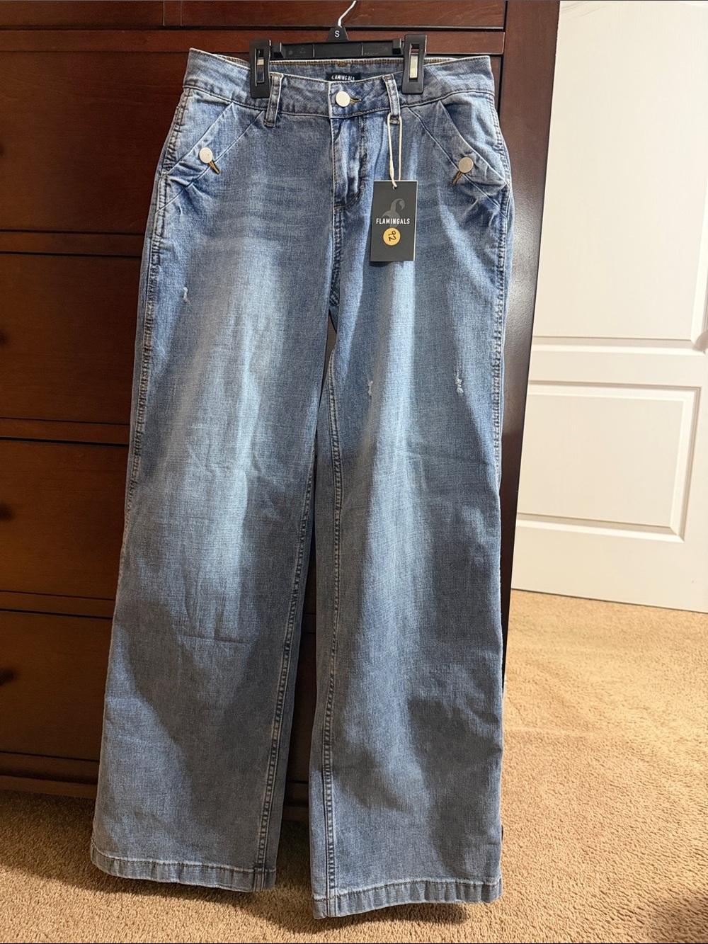 Flaming gals Wide-Leg women’s Jeans in Light Blue Denim. Flare leg size small.